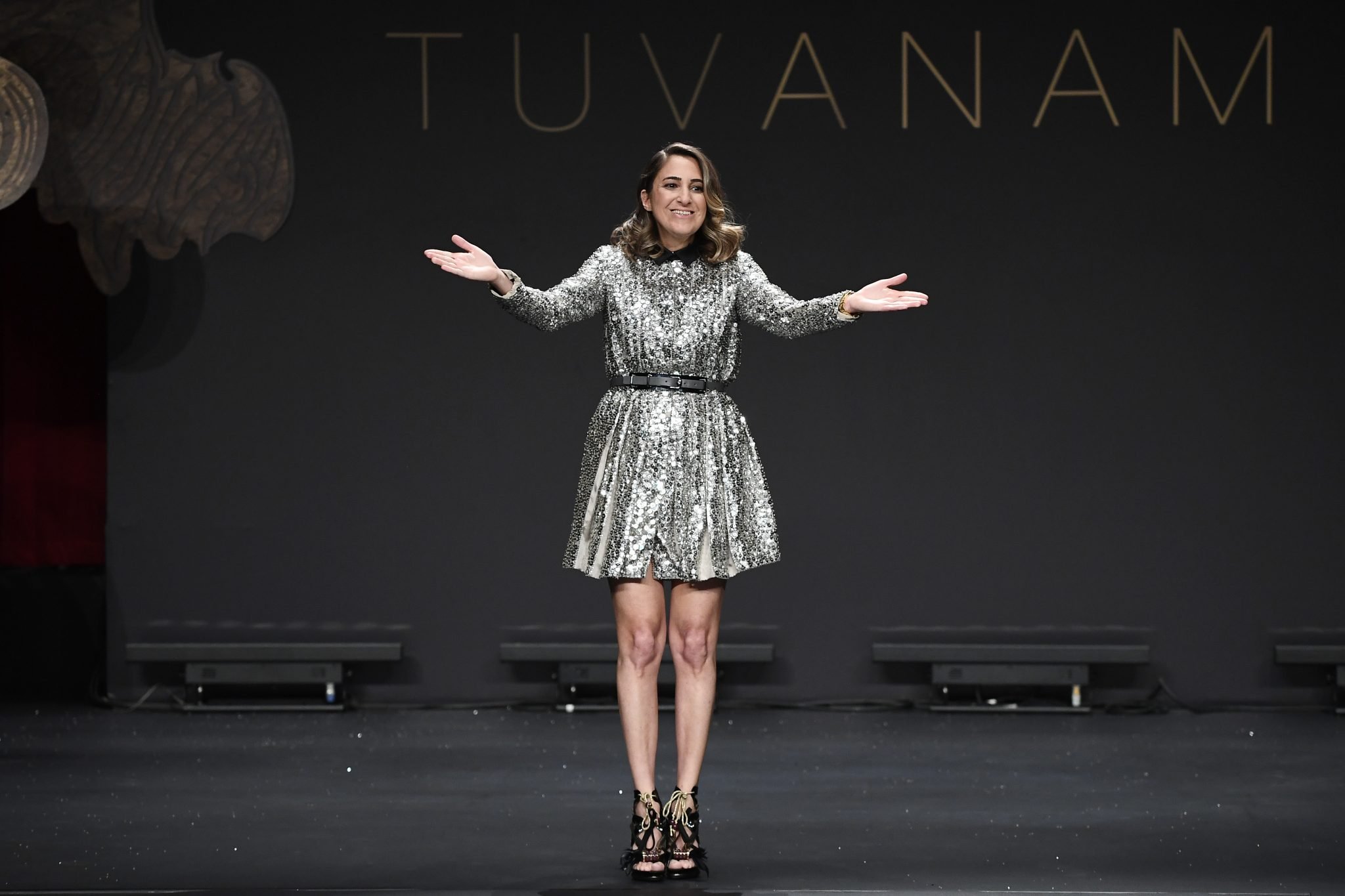 ISTANBUL, TURKEY - MARCH 23: Designer Tuvana Demir acknowledges the applause of the audience after the Tuvanam show during Mercedes-Benz Istanbul Fashion Week March 2017 at Grand Pera on March 23, 2017 in Istanbul, Turkey. (Photo by Gareth Cattermole/Getty Images for IMG)